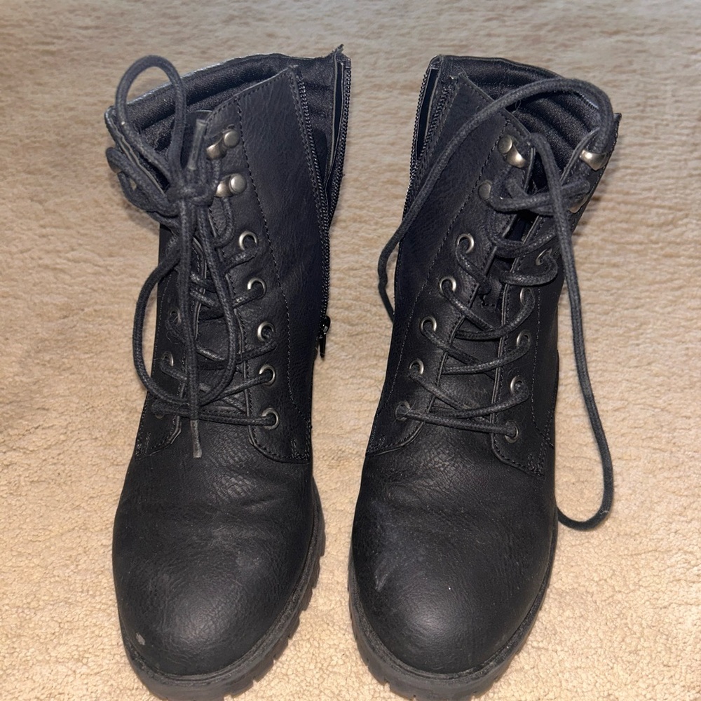 Lightly worn combat boots